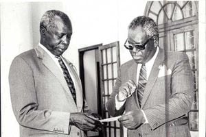 Then President Daniel arap Moi and his vice-president Dr Josephat Karanja
