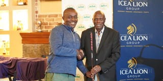 ICEA LION Group Chairman Joe Wangai awards the winner of Patron's Putter Gregory Mburu 